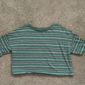 green white and pink short sleeve shirt